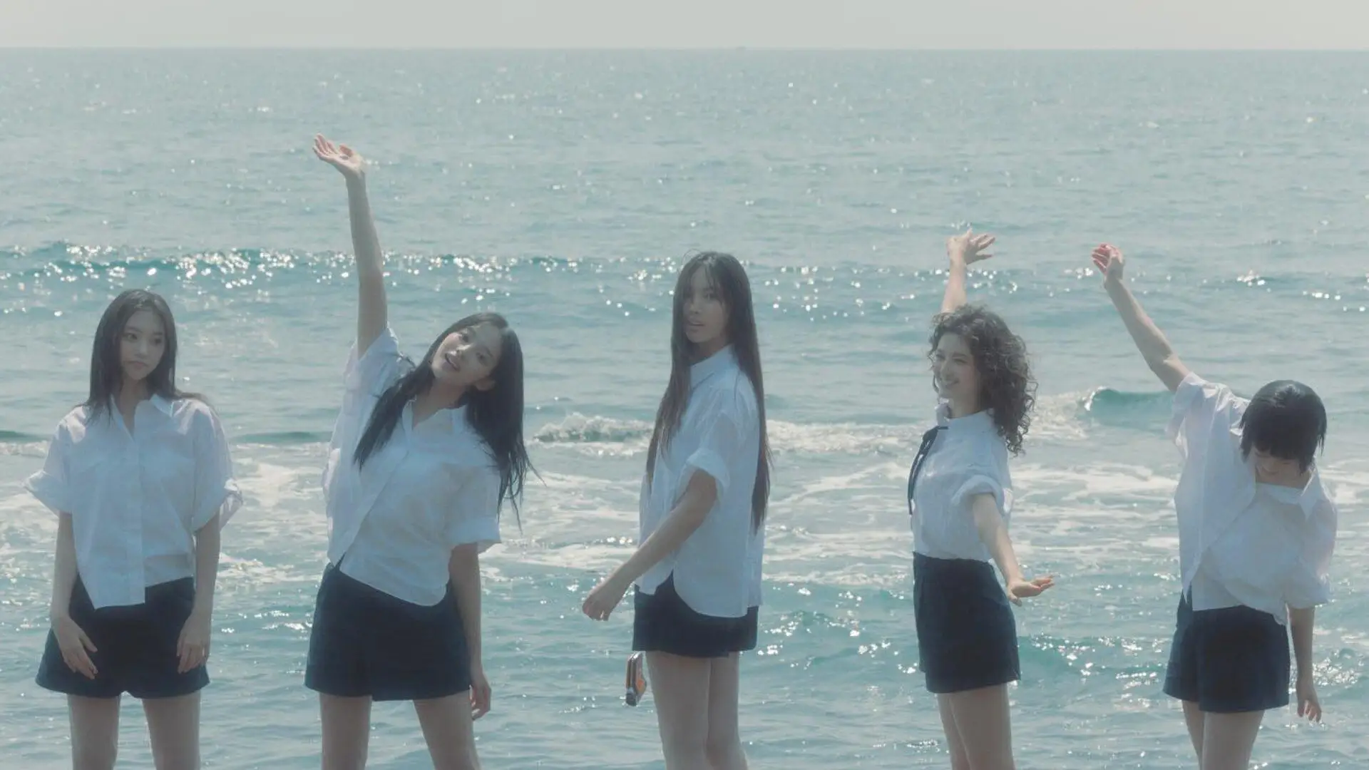 NewJeans Bubble Gum summer music video scene
