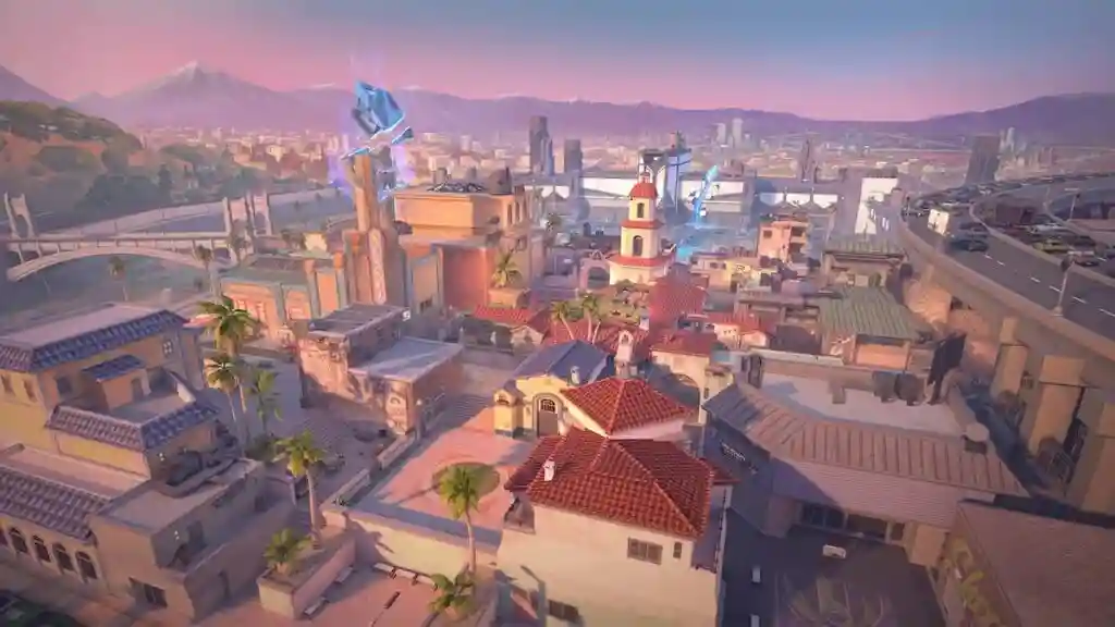 Sunset's Los Angeles-inspired streets and buildings at dusk in VALORANT
